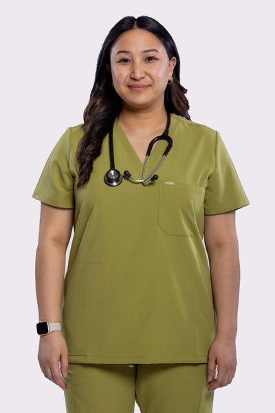 Vena scrub top in olive colour featuring front shot from thigh up #colour_olive