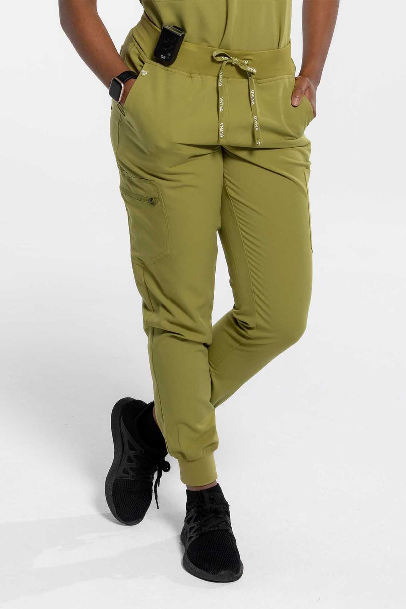 Women's SAYA Jogger Scrub Pant in olive colour featuring front angle shot #colour_olive