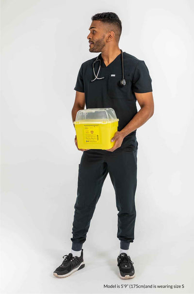 Men's AESON Scrub Top man holding yellow hazard container #colour_black