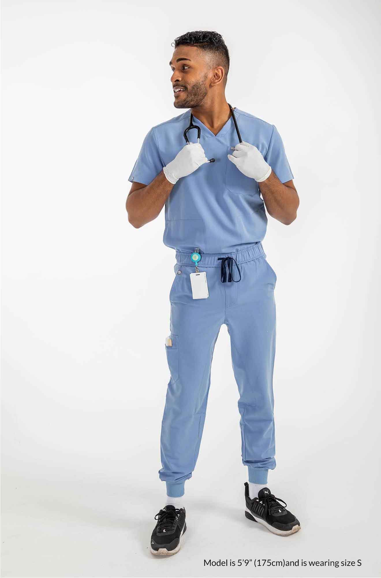 Men's AESON Scrub Top man holding stethoscope on her neck #colour_ceil-blue